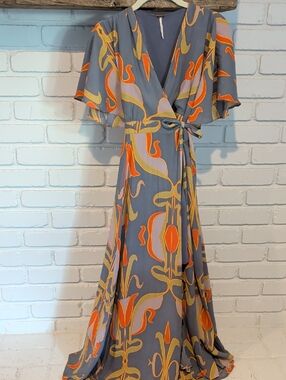 Free People Boho Art Nouveau Maxi Wrap Dress, featuring a blue and orange